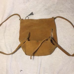 Brown leather hobo backpack